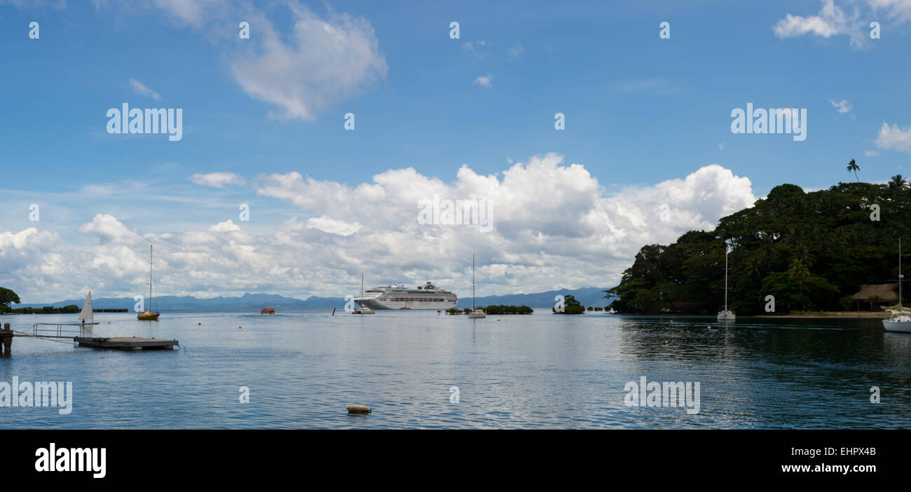 Cruise ship at anchor of the port of SavuSavu located in the pacific island of Fiji. Stock Photo