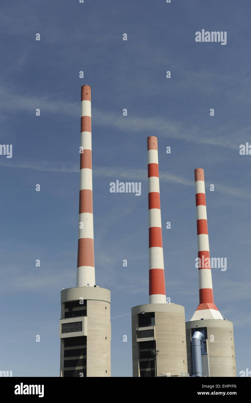 three chimneys at electric power station Stock Photo