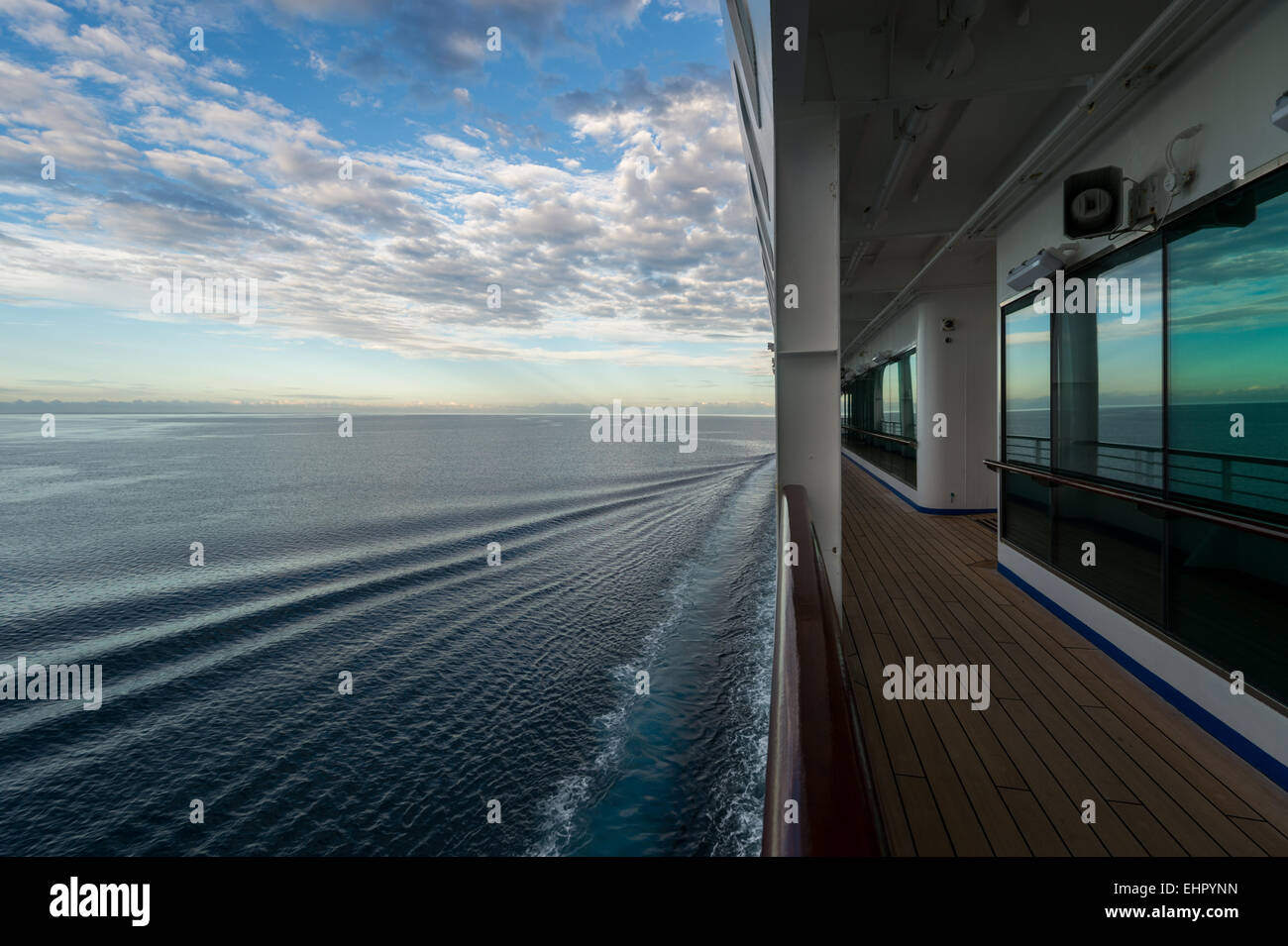 Sunset on a cruise ship Stock Photo - Alamy