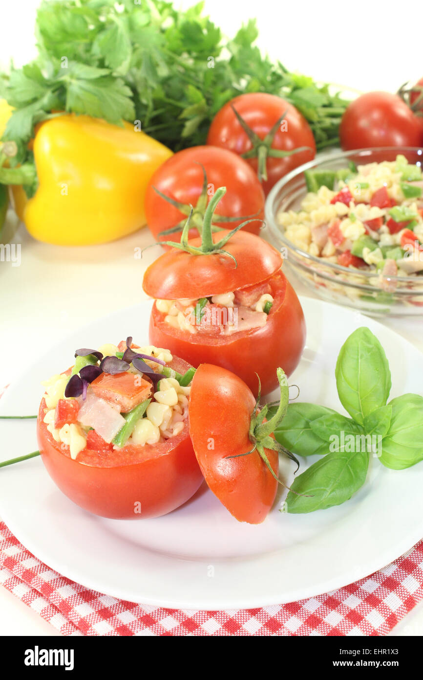 stuffed tomatoes with pasta salad Stock Photo