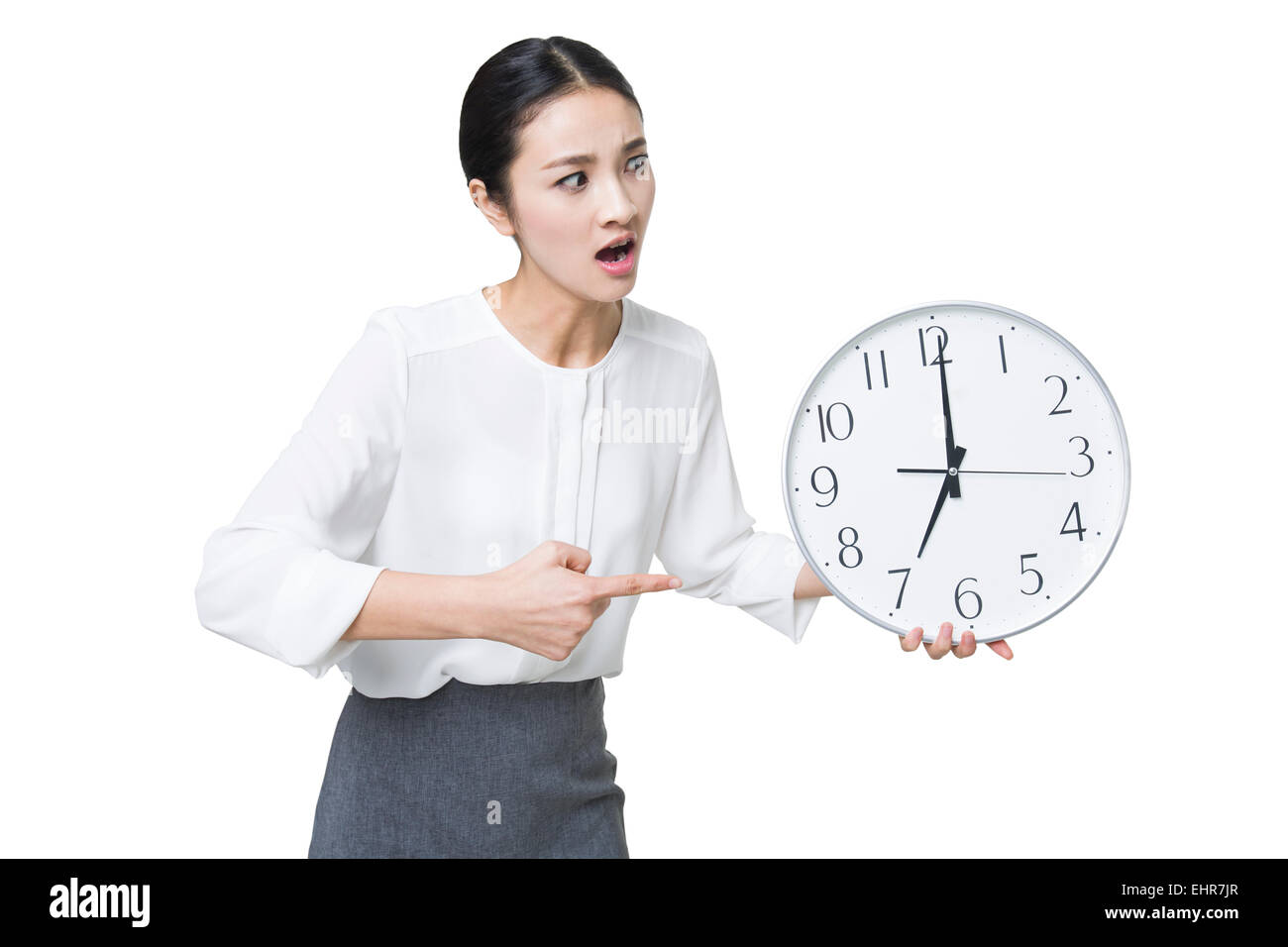 Staring At Clock Rage Angry businesswoman pointing at a clock Stock Photo - Alamy