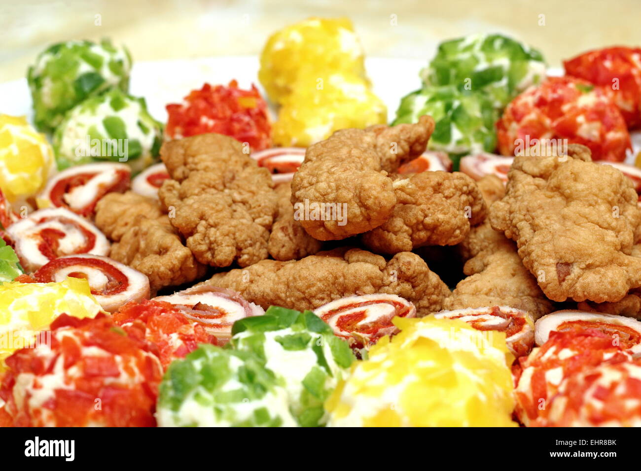 pork schnitzel and cheese balls decorated with pieces of pepper Stock Photo