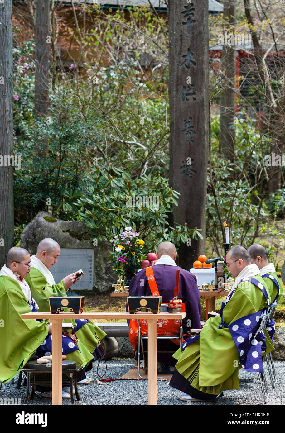 Sanzen-in Buddhist temple, Ohara, Japan. The abbot prepares to lead a ceremony at an outdoor altar in spring Stock Photo