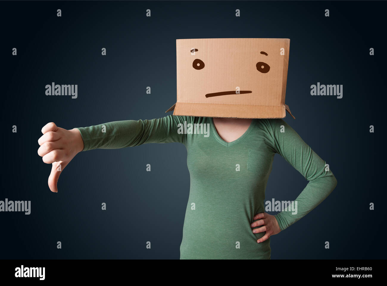 Young girl gesturing with a cardboard box on her head with straight
