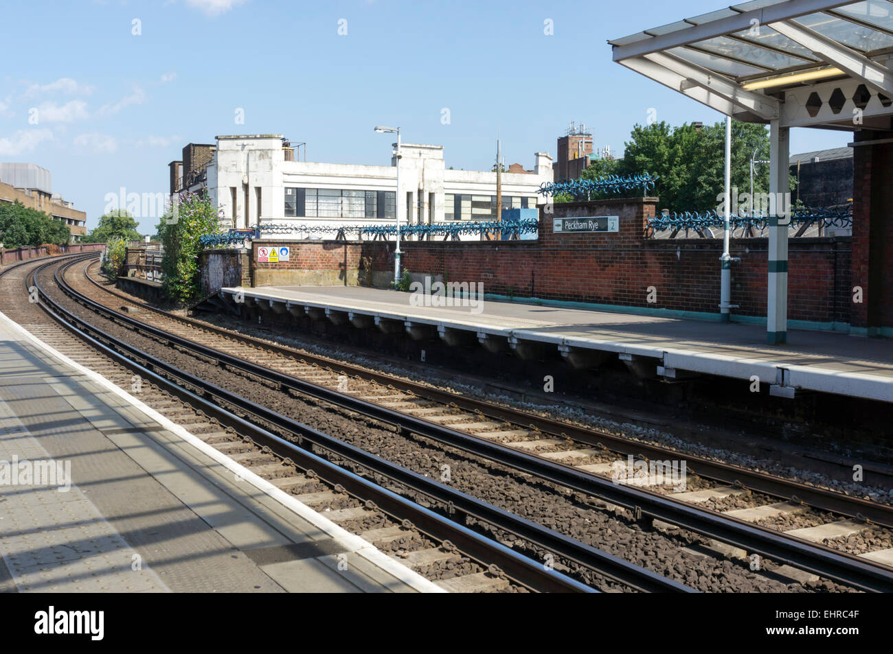 Peckham Rye railway station on an embankment in South London. Stock Photo