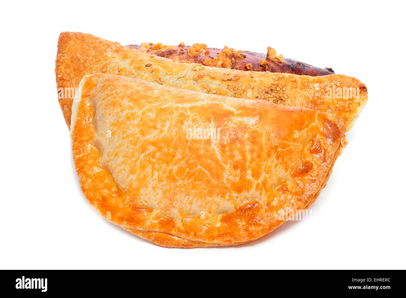 some different empanadas argentinas, typical argentine stuffed pastries, on a white background Stock Photo