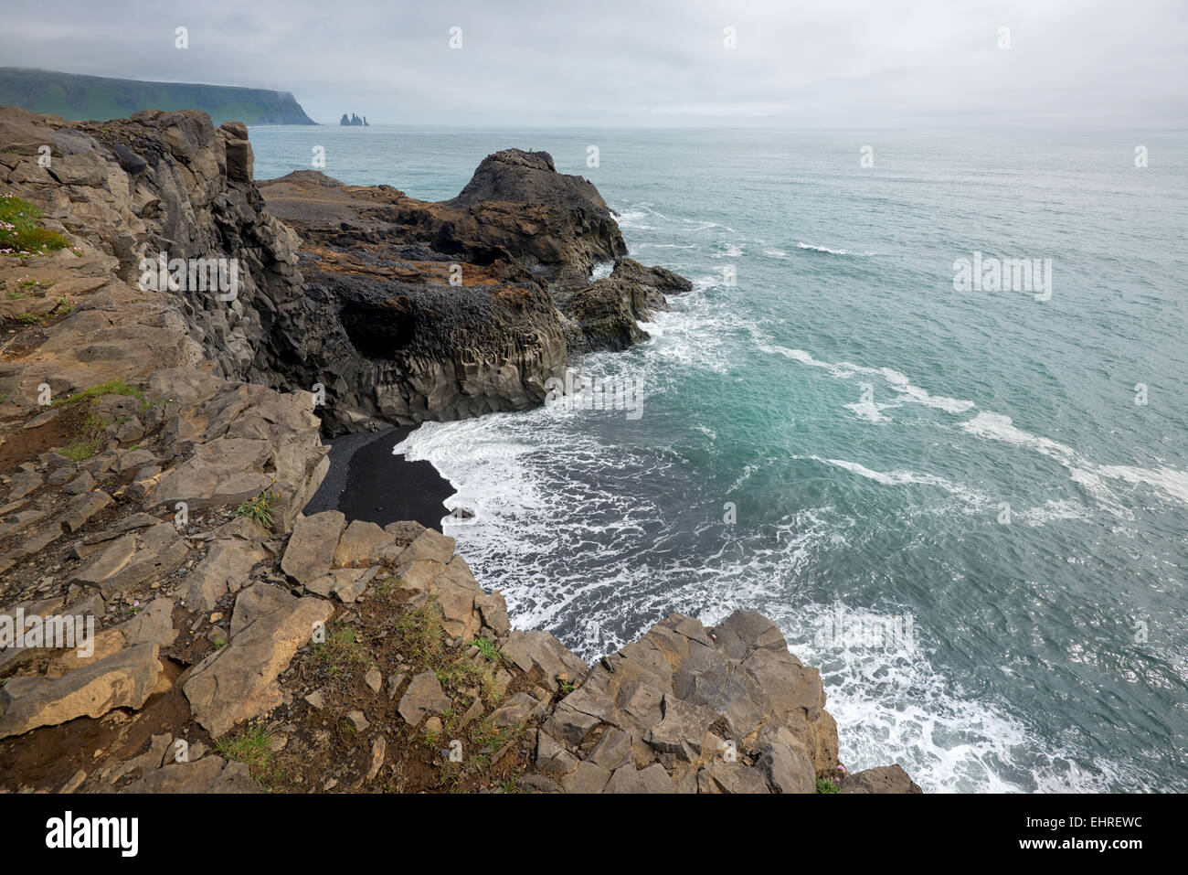 Beautiful view from Dyrholavegur, of black volcanic sand beach in Vik, Iceland Stock Photo