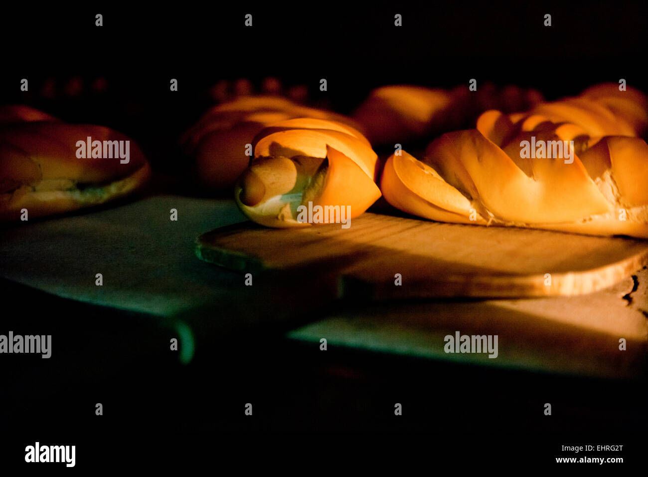 Oven inside plenty of bread. Manufacturing process of spanish bread