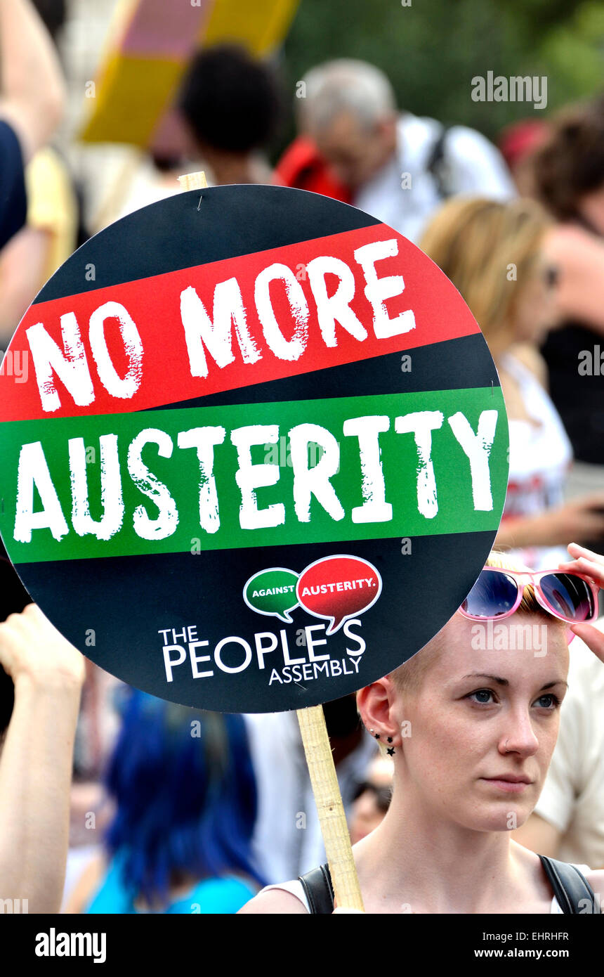 Woman holding No More Austerity placard at the People's Assembly march against Austerity, London, 21st June 2014 Stock Photo