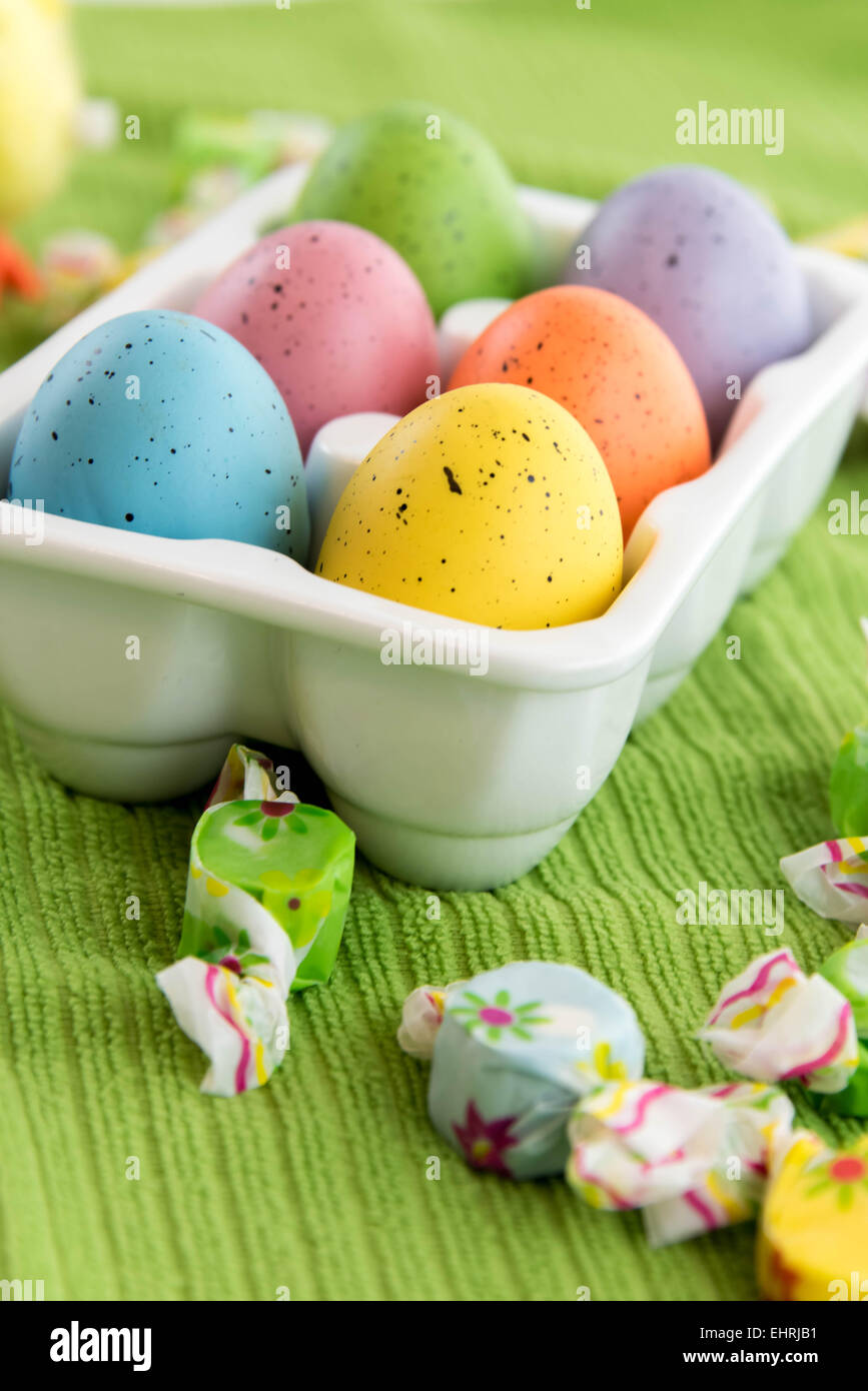 pastel colored eggs and candy Stock Photo Alamy