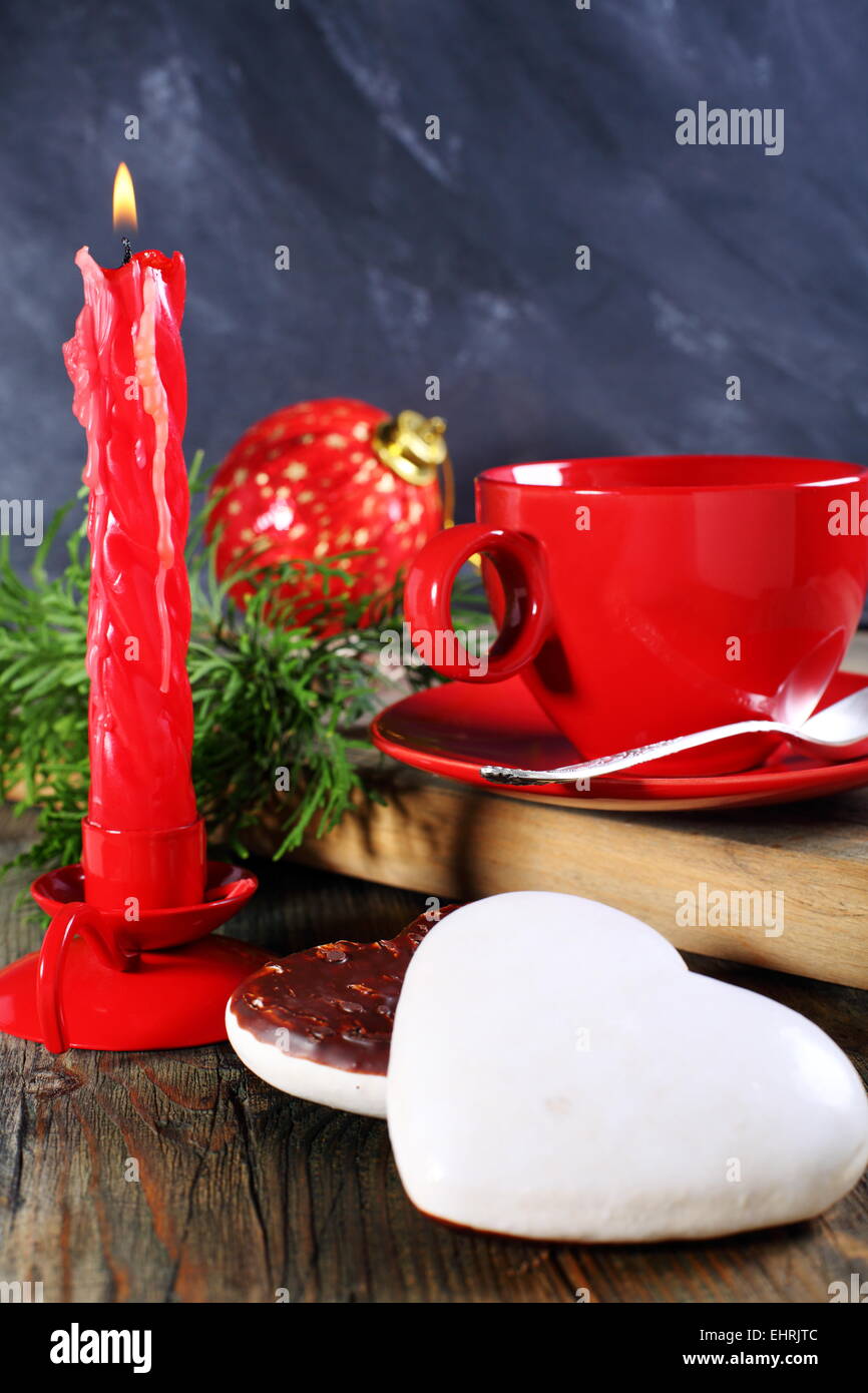 Christmas cookies and candle. Stock Photo