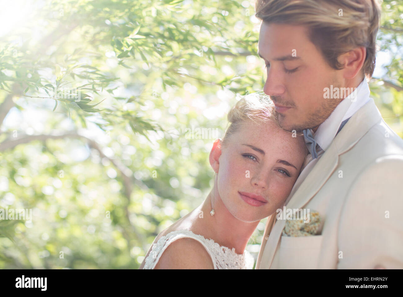 Portrait of young couple in domestic garden Stock Photo