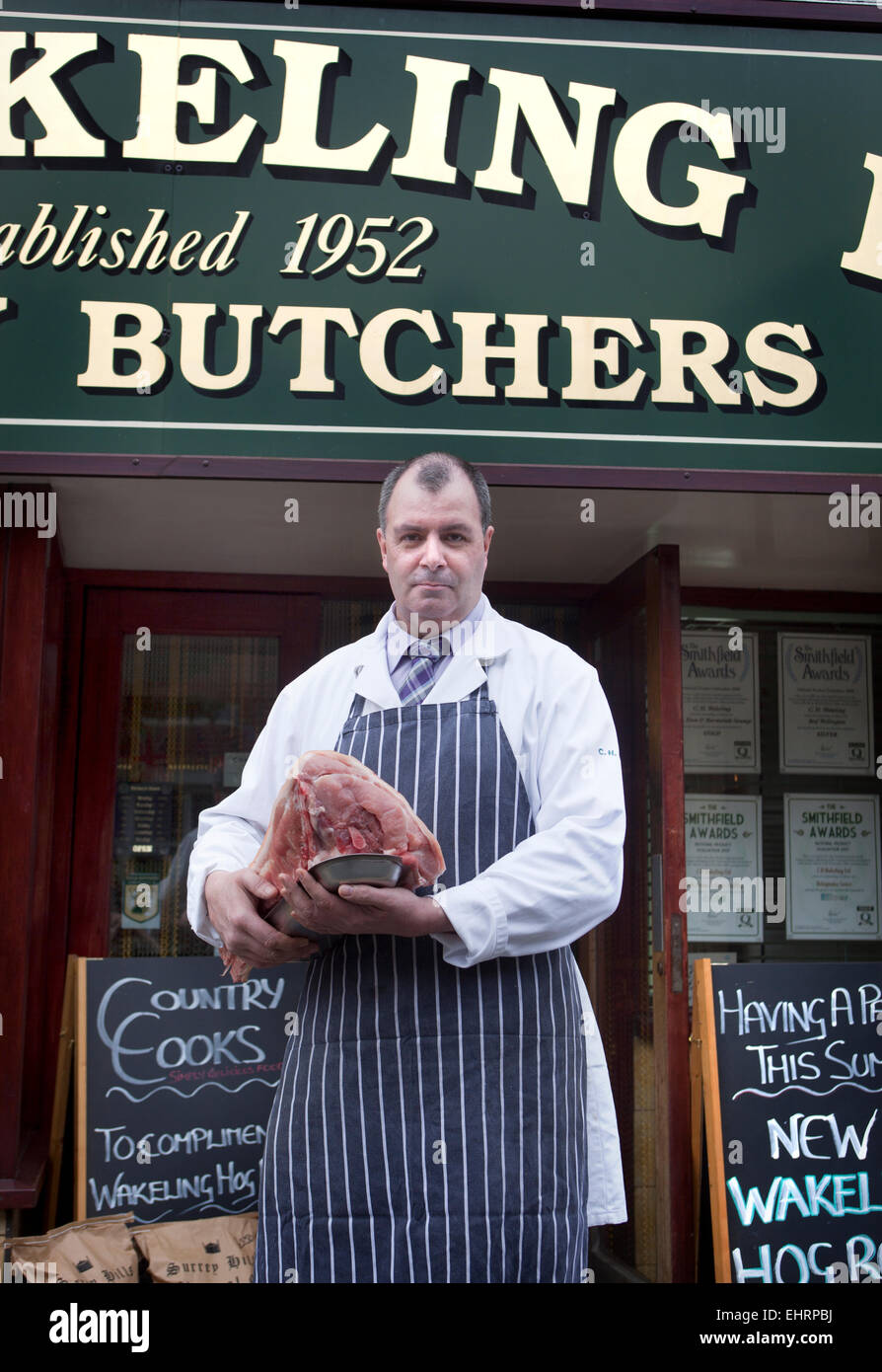 Mark Holt at C H Wakeling Family Butcher in Godalming Surrey England UK Stock Photo