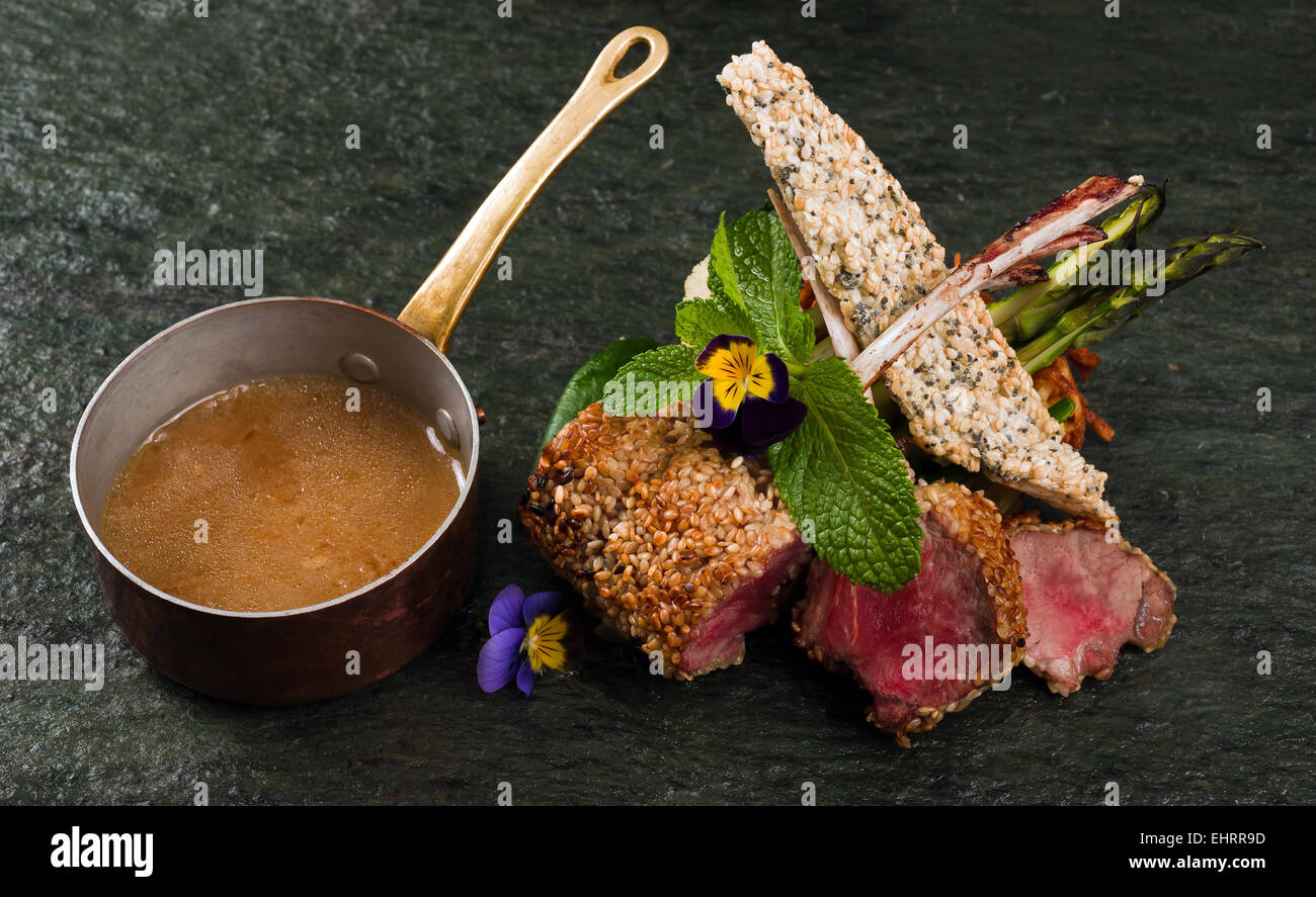 Lamb chops with mint and souce Stock Photo