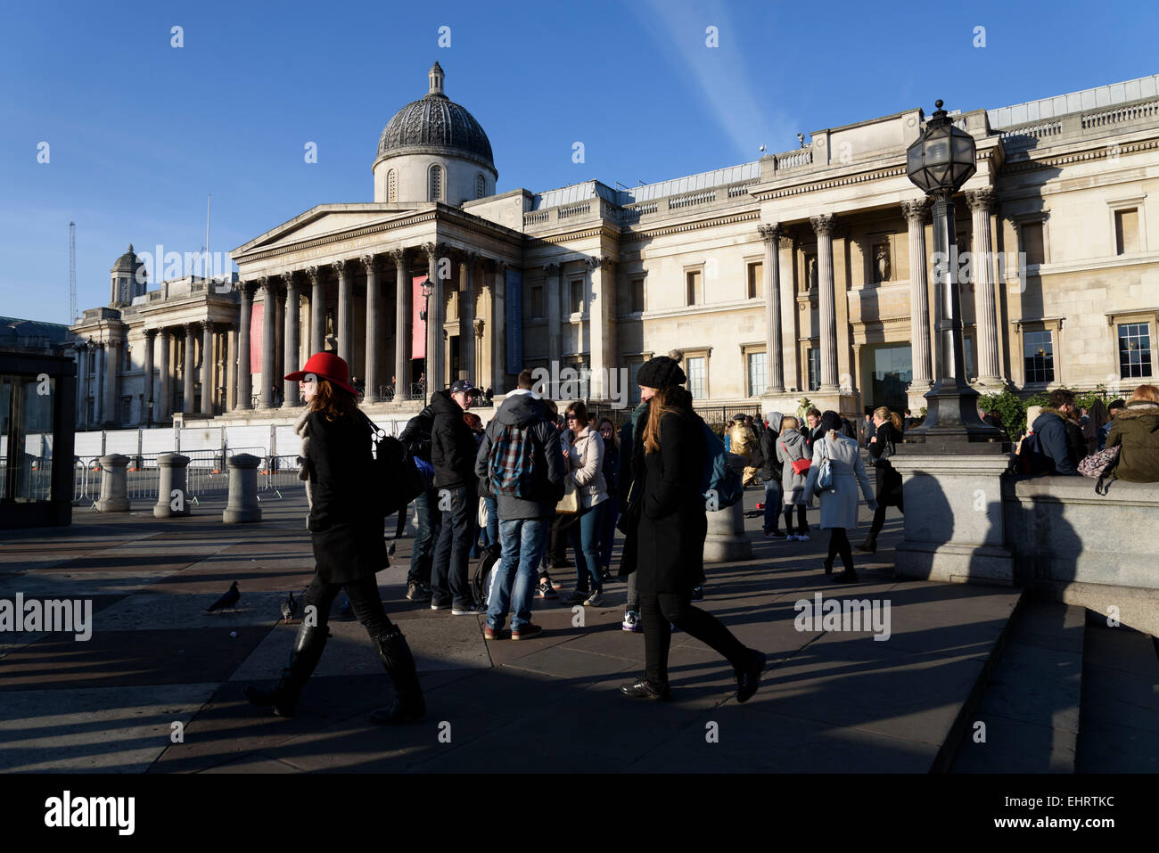 Crowd in Trafalgar Square in front of the National Gallery, London. Stock Photo