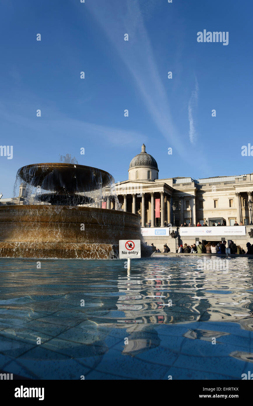 London Trafalgar Square fountain with 'no entry' sign. National Gallery in the background. Stock Photo