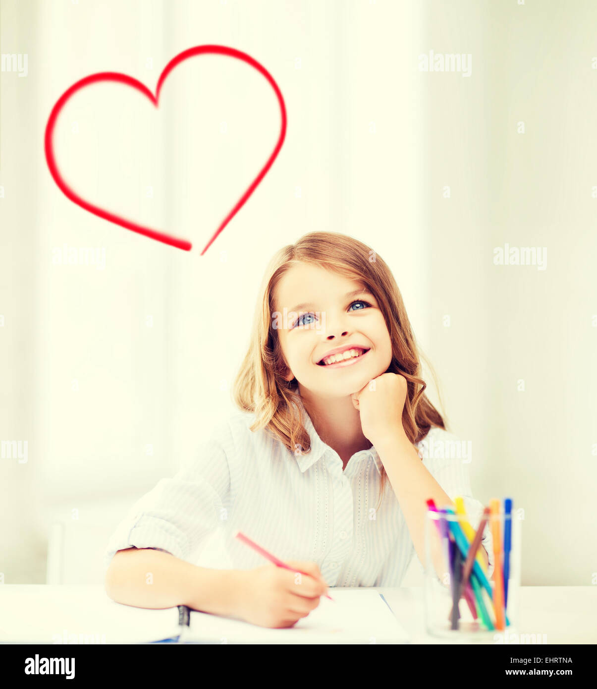 smiling little student girl drawing at school Stock Photo - Alamy