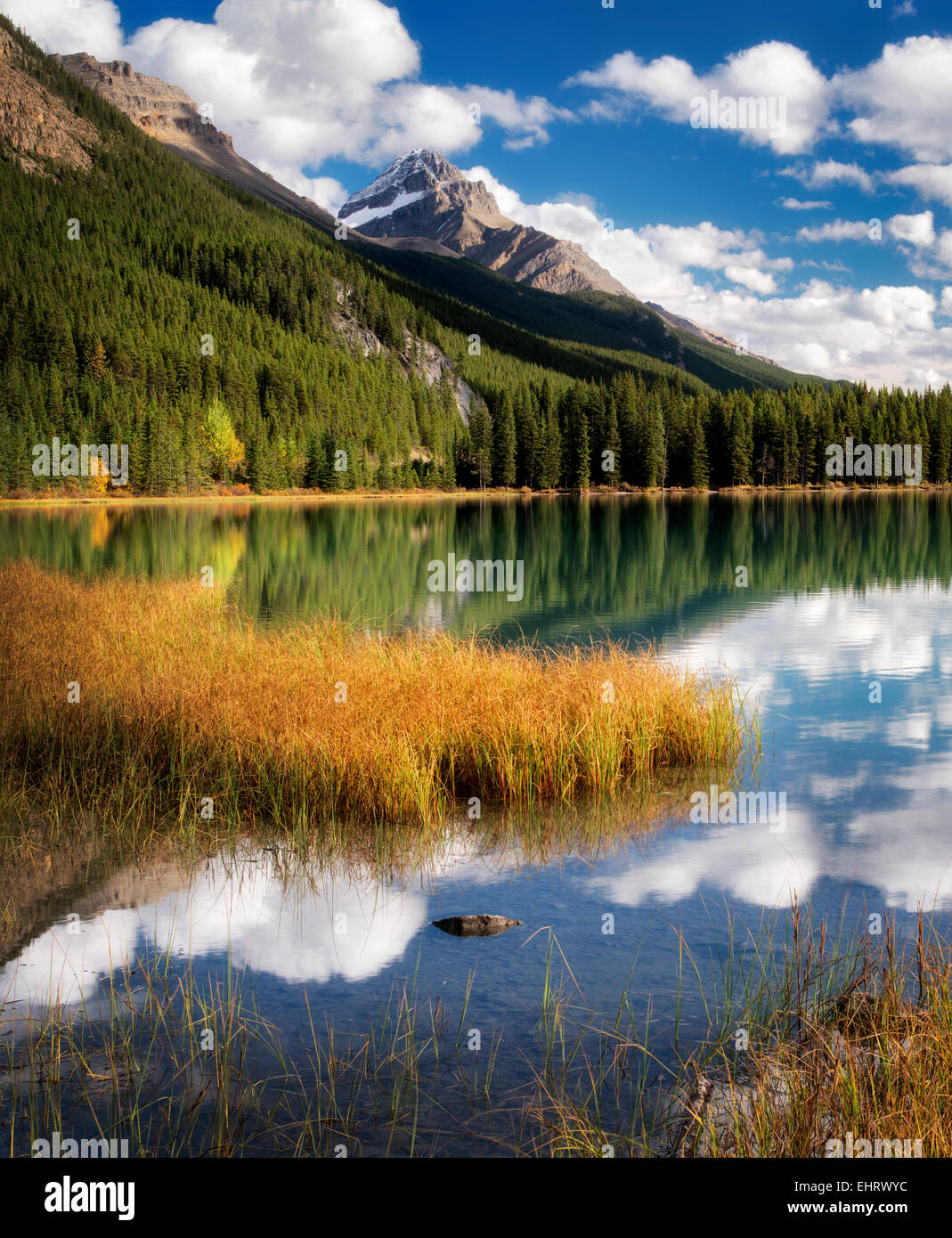 Clouds and reflection in Waterfowl Lakes. Banff National Park. Alberta. Canada. Stock Photo