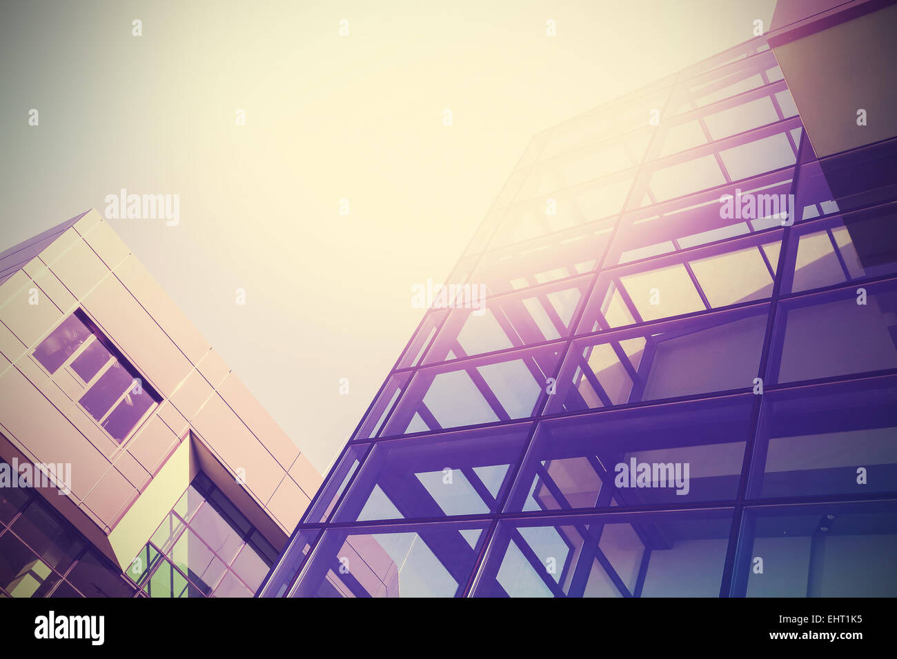 Modern office buildings background, vintage colors style. Stock Photo