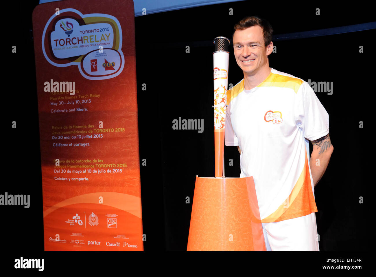 Toronto, Canada. 16th March 2015. Unveiling of the 2015 PAN AM Games Torch and Torchbeaer at the Ontario Science Centre in preparation for the Torch Relay which will  take place from May 30 to July 10 in the lead up to Toronto 2015 PAN AM Games. In picture, Simon Whitfield. Credit:  EXImages/Alamy Live News Stock Photo