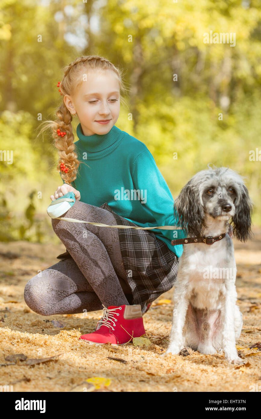 Girl walking her dog hi-res stock photography and images - Alamy