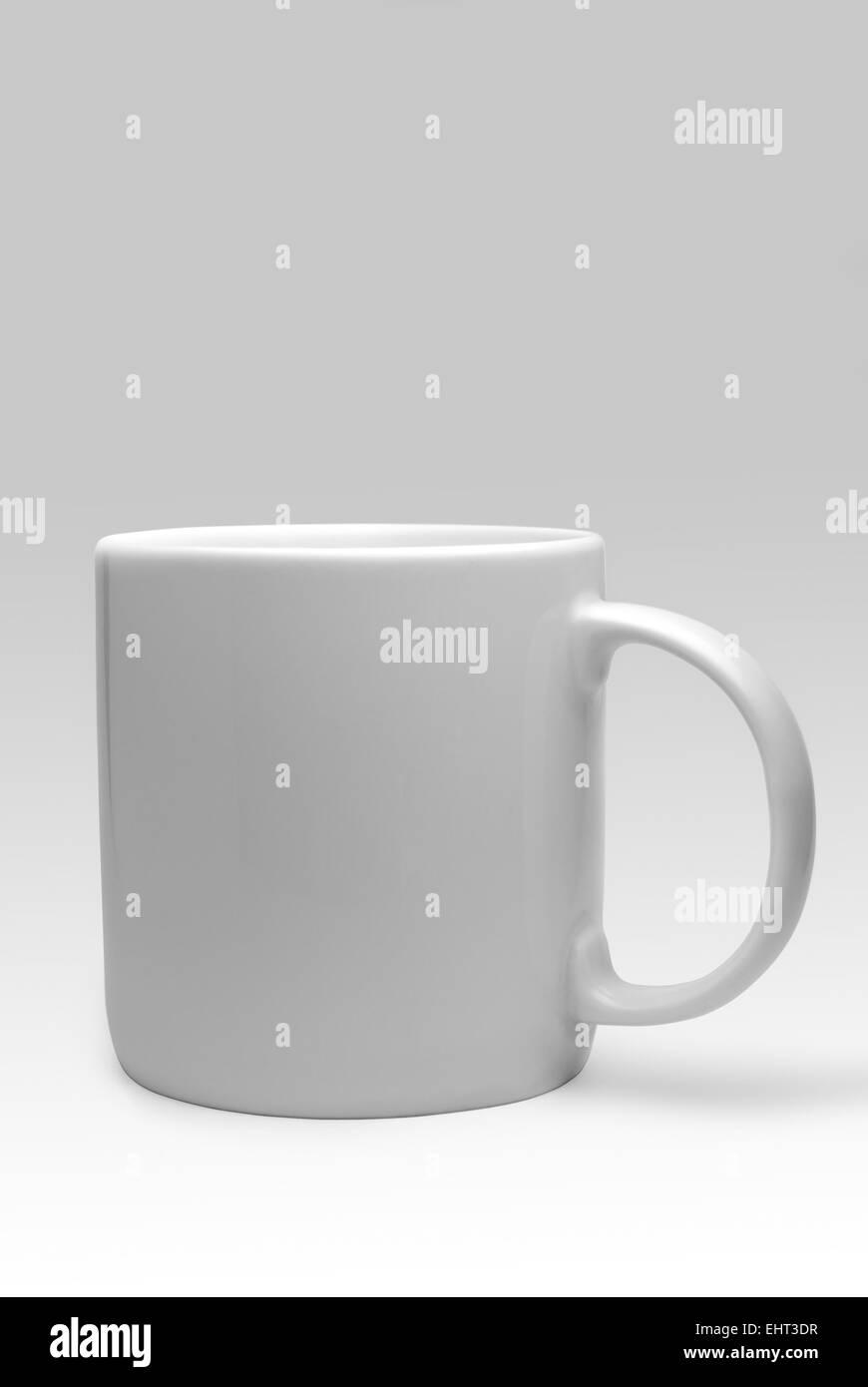 White mug isolated with clipping path - vertical Stock Photo