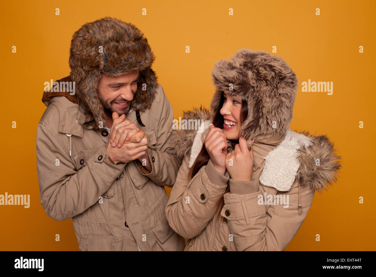 Happy young couple in winter hi-res stock photography and images - Alamy