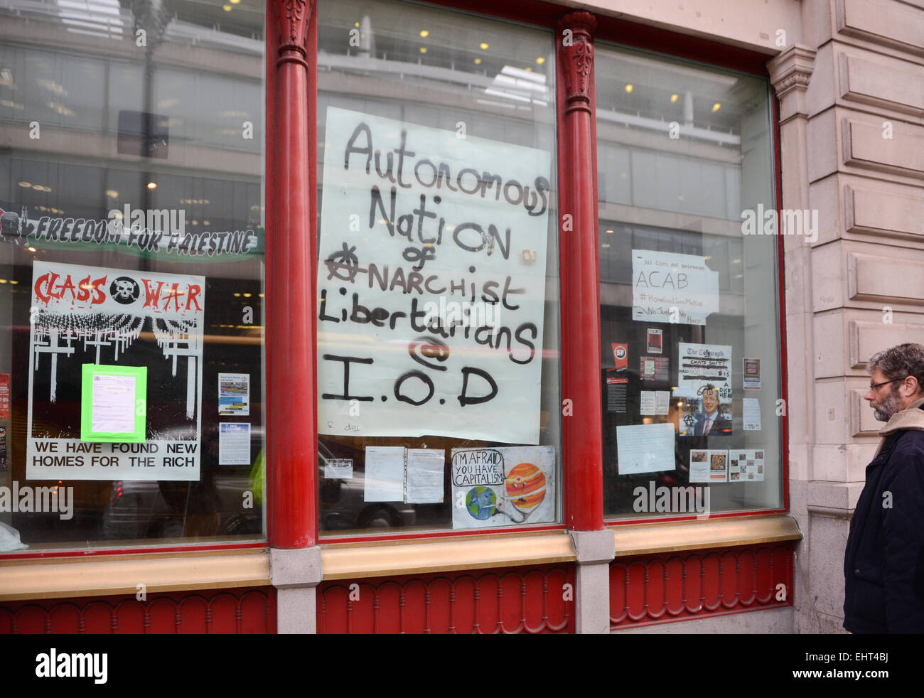 Pall Mall, London, UK. 17th March 2015. An anarchist group calling themselves 'Autonomous Nation of Anarchist Libertarians' is occupying the former HQ of the Institute of Directors on Pall Mall Credit:  Matthew Chattle/Alamy Live News Stock Photo