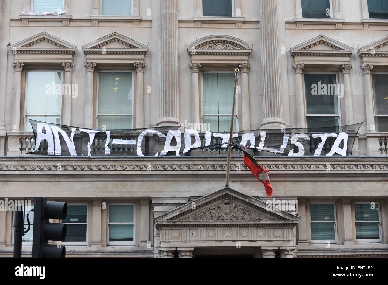 Pall Mall, London, UK. 17th March 2015. An anarchist group calling themselves 'Autonomous Nation of Anarchist Libertarians' is occupying the former HQ of the Institute of Directors on Pall Mall Credit:  Matthew Chattle/Alamy Live News Stock Photo