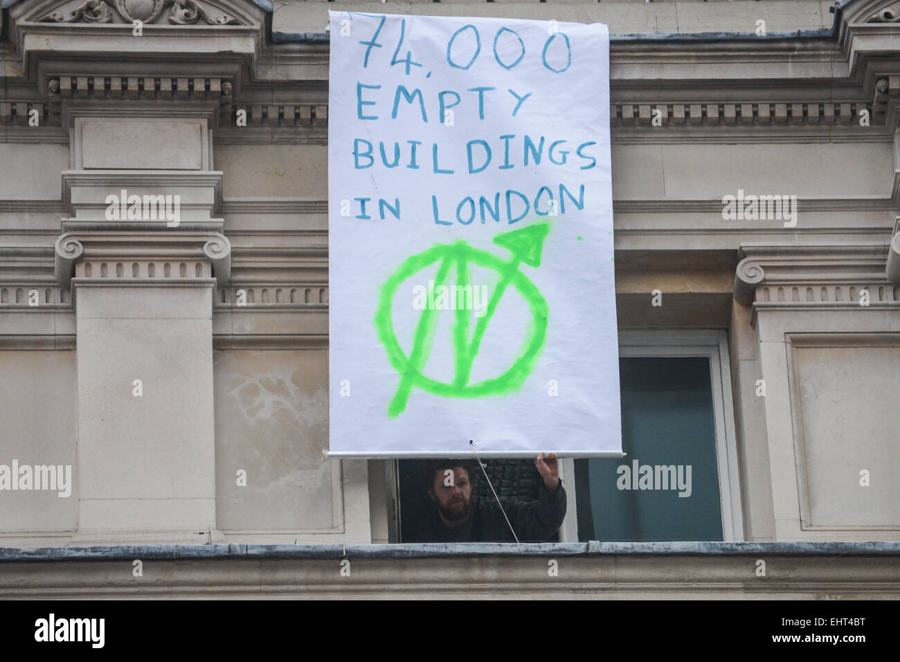 Pall Mall, London, UK. 17th March 2015. The legal document taped to the window. An anarchist group calling themselves 'Autonomous Nation of Anarchist Libertarians' is occupying the former HQ of the Institute of Directors on Pall Mall Credit:  Matthew Chattle/Alamy Live News Stock Photo