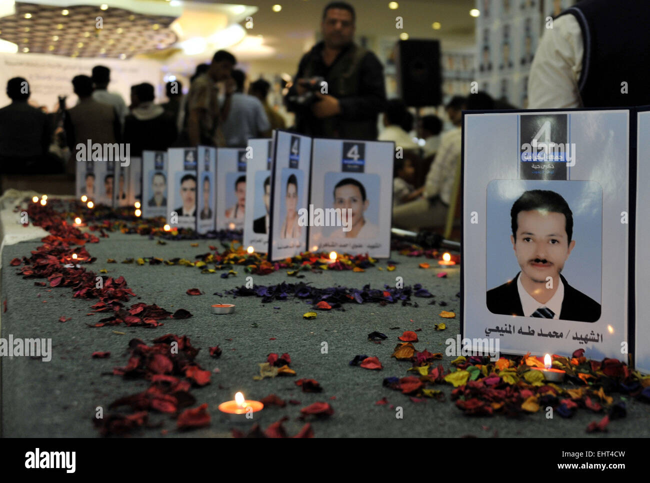 Sanaa, Yemen. 17th Mar, 2015. Pictures of victims were shown at a ceremony held to commemorate the 4th anniversary of an anti-government protest in Sanaa, Yemen, March 17, 2015. More than 50 protesters were killed on March 18, 2011 when they were rallying against former President Ali Abdullah Saleh in Sanaa. Credit:  Hani Ali/Xinhua/Alamy Live News Stock Photo