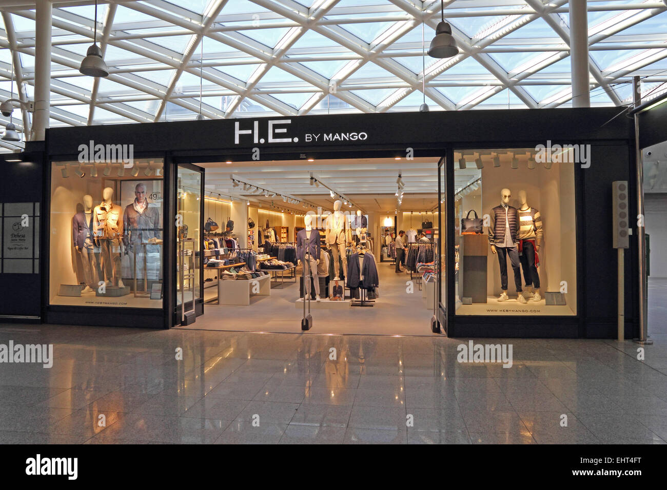 H.E. by Mango mens fashion shop, Barcelona El Prat airport Stock Photo