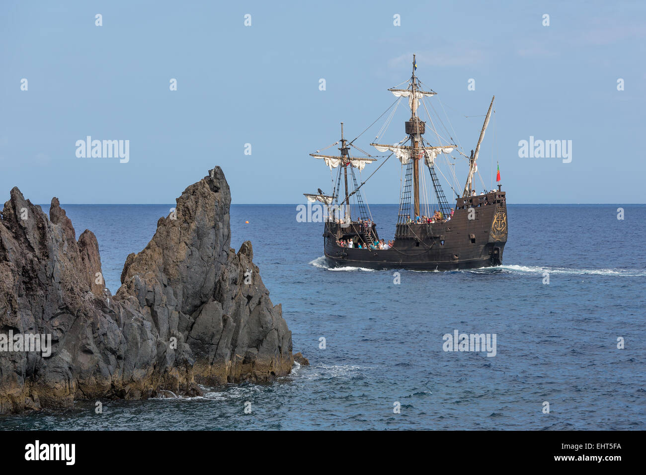 Tourists making a cruise with a replica of vessel 'Santa Maria' of Columbus near Funchal at Madeira Island, Portugal Stock Photo