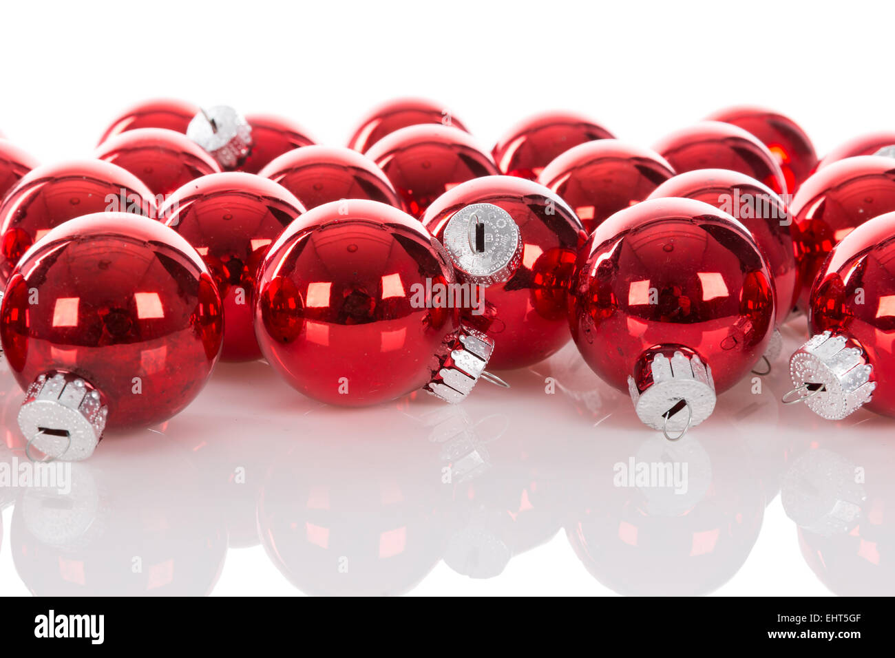 Red Christmas balls isolated over a white background Stock Photo - Alamy