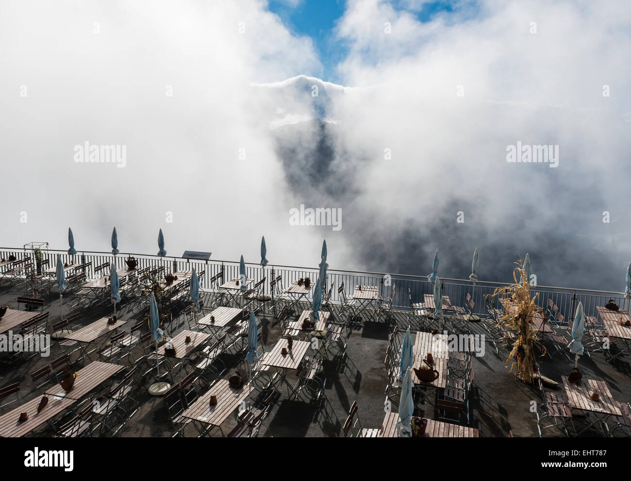Schynige Platte terrace in Mountains with several chairs and tables in