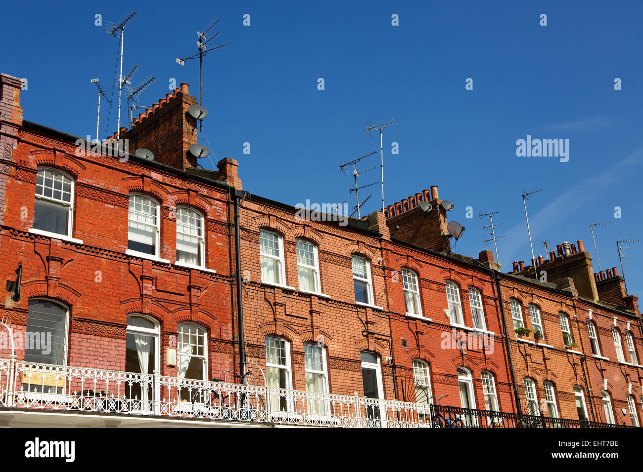 Row of Georgian or Victorian terraced properties in the suburbs of London. Stock Photo
