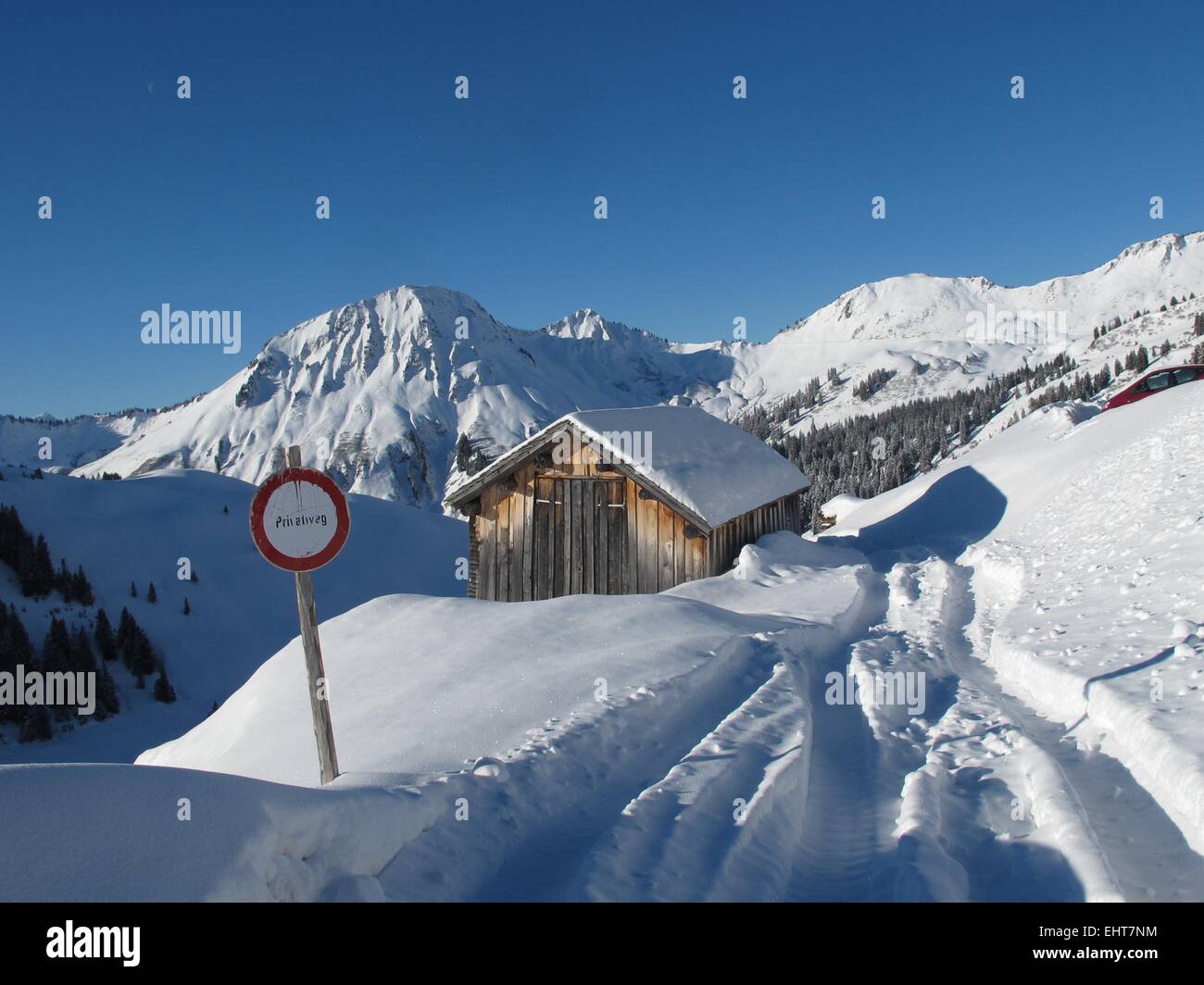 Mountain hut in deep snow Stock Photo