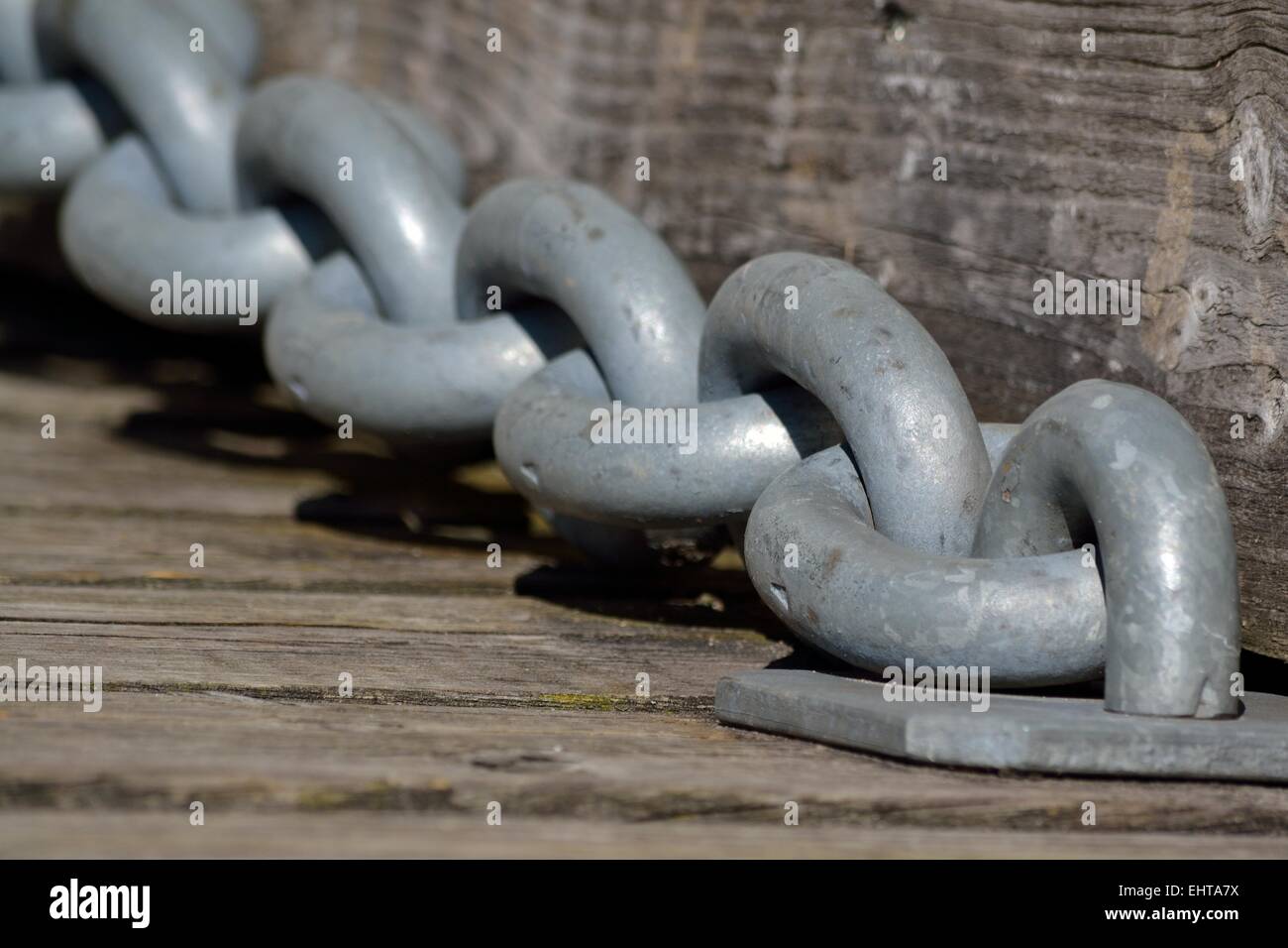 massive chain at a castle bridge Stock Photo