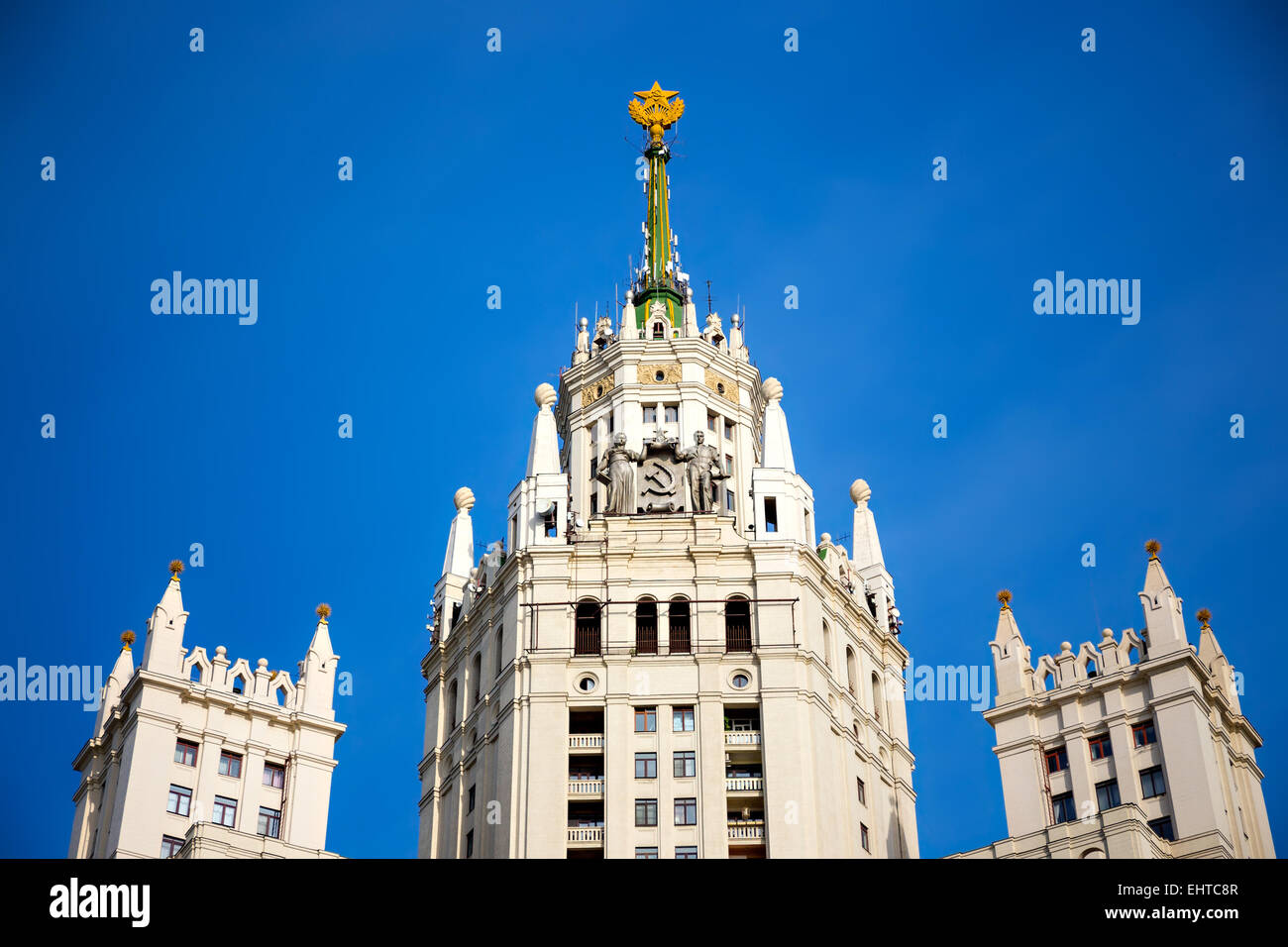 The tower and spire of the Kotelnicheskaya skyscraper on the sky background in Moscow, Russia Stock Photo
