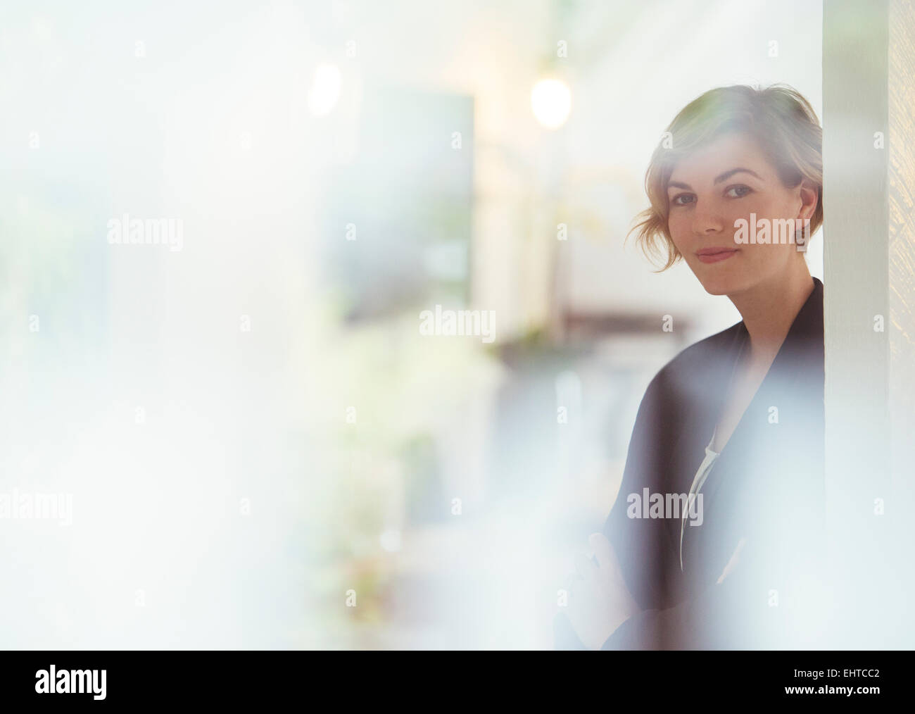 Portrait of young woman at office Stock Photo