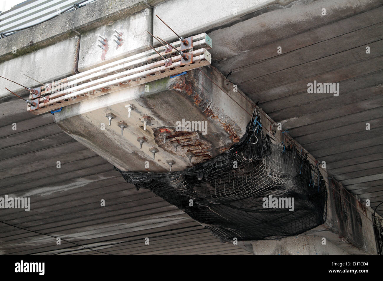 Exposed steel reinforcing being repaired on the elevated section of the M4 motorway in Brentford, West London, England. Stock Photo