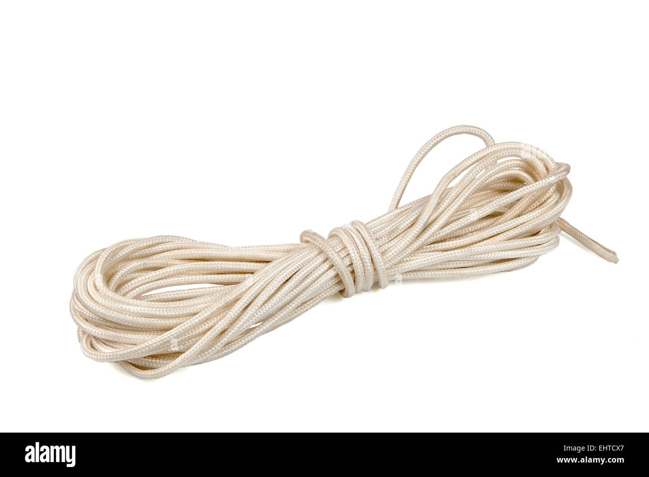 Hank of rope isolated over white background Stock Photo - Alamy