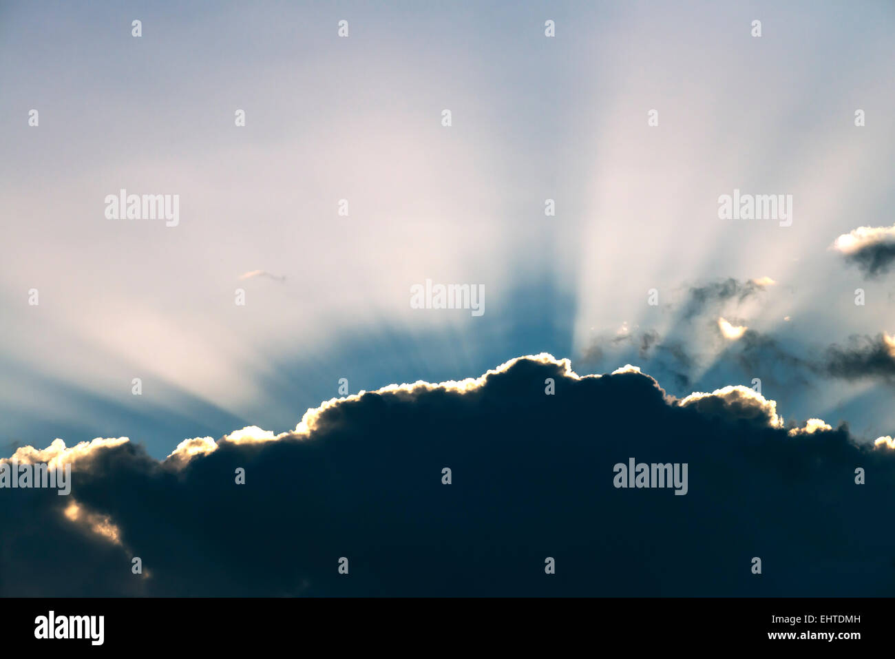 Clouds and sun rays, backlight Stock Photo