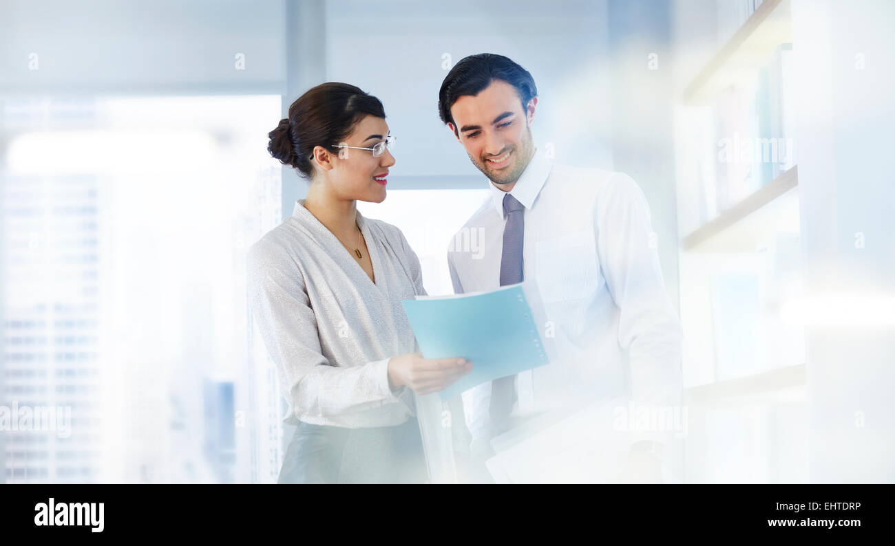 Man and woman talking in office Stock Photo