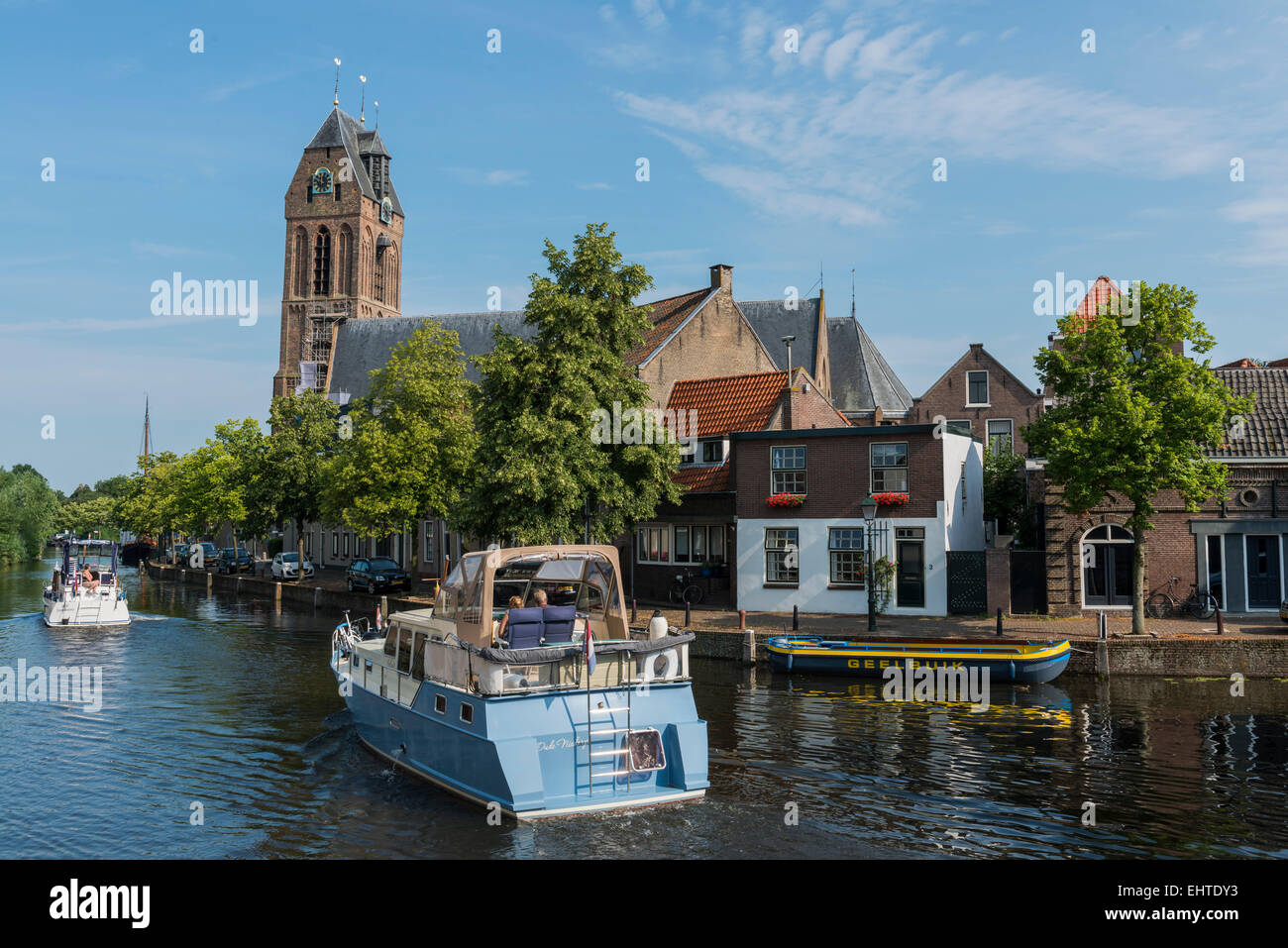 Two motorboats on the Hollandse IJssel in Oudewater. Stock Photo