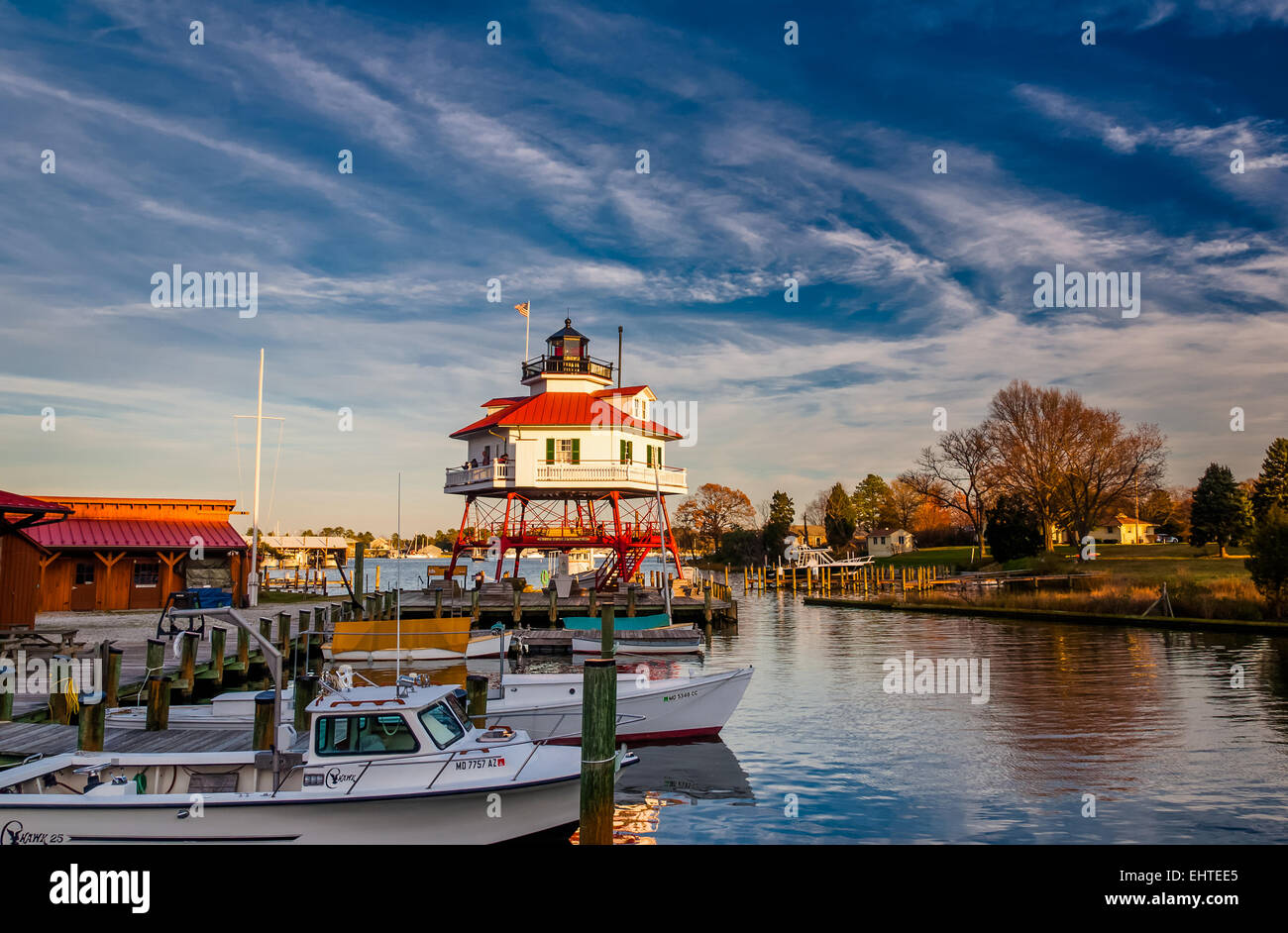 Boats and lighthouse in the harbor of Solomon's Island, Maryland Stock
