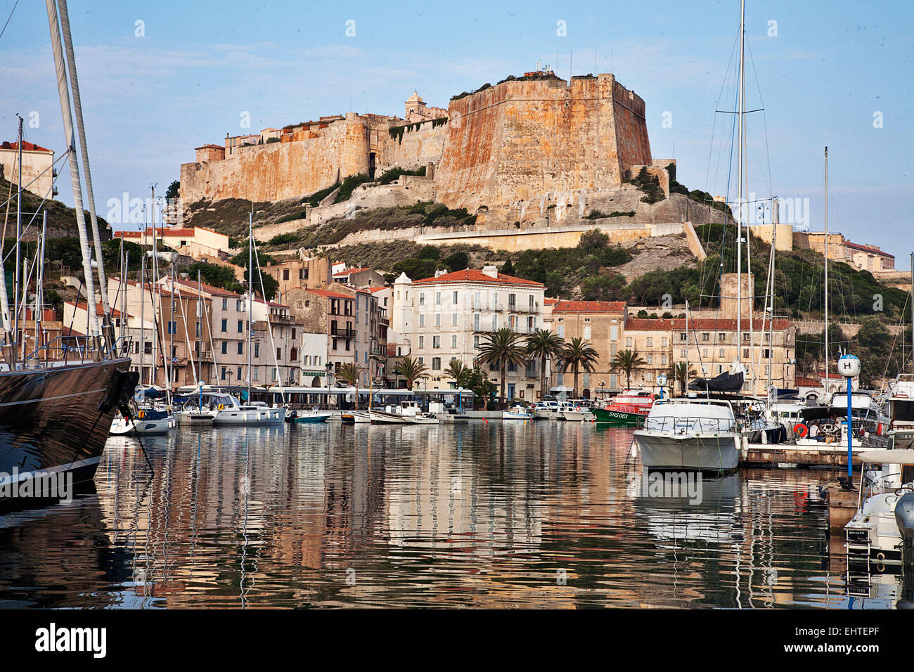 The quay and fortress at Bonifacio are picturesque and historic. Stock Photo