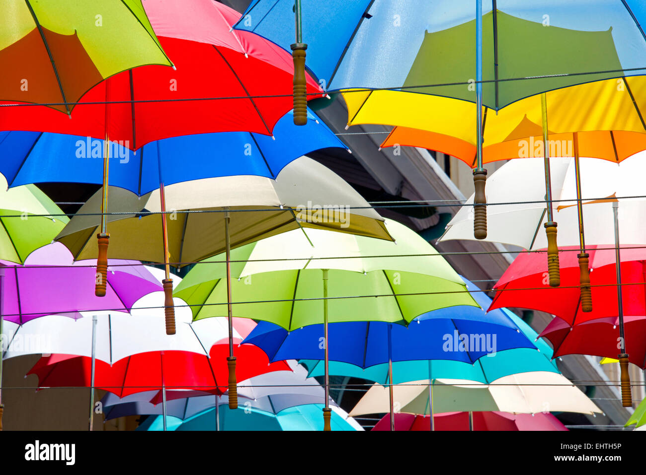 Collection colorful open large umbrellas Stock Photo