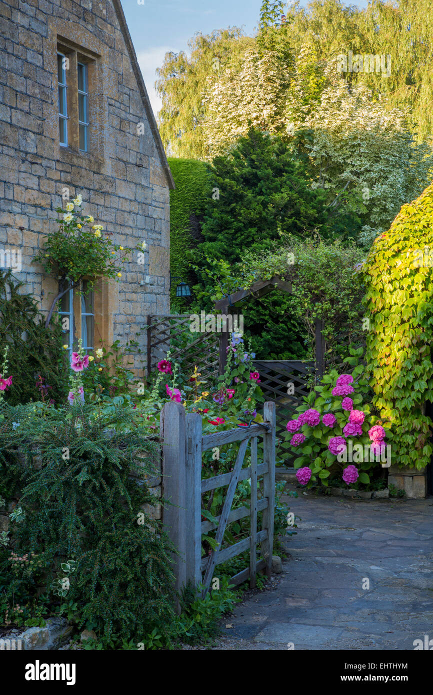Gated entry to cottage garden in Stanton, Gloucestershire, England, UK Stock Photo
