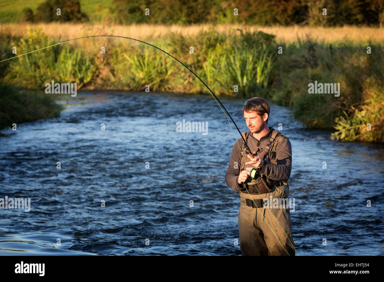 FLY FISHING IN THE EURE (27), FRANCE Stock Photo